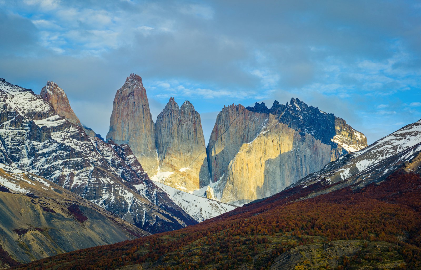 Snow-dusted Andean peaks under a clear cordillera sky