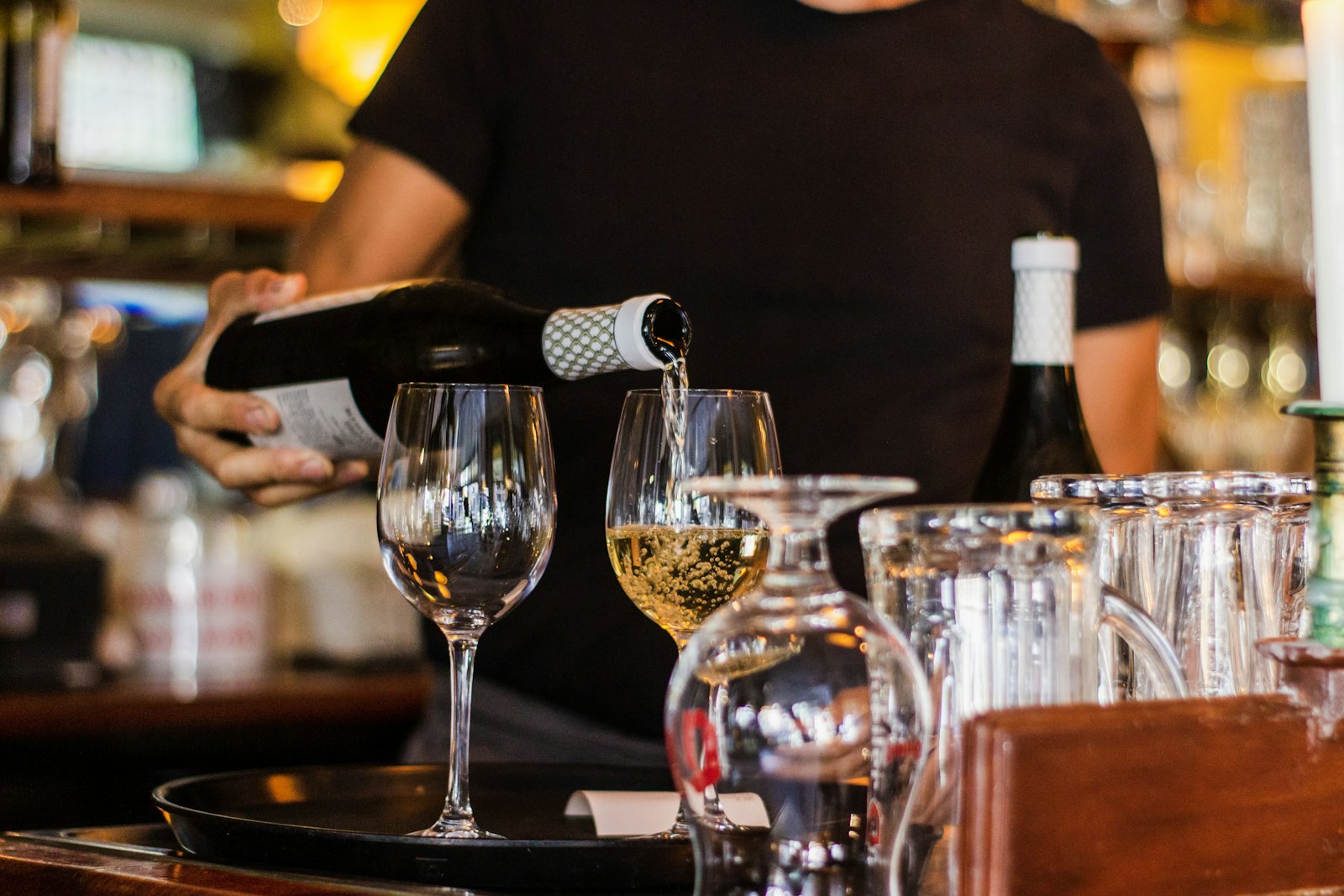 Wine poured at a fine-dining table
