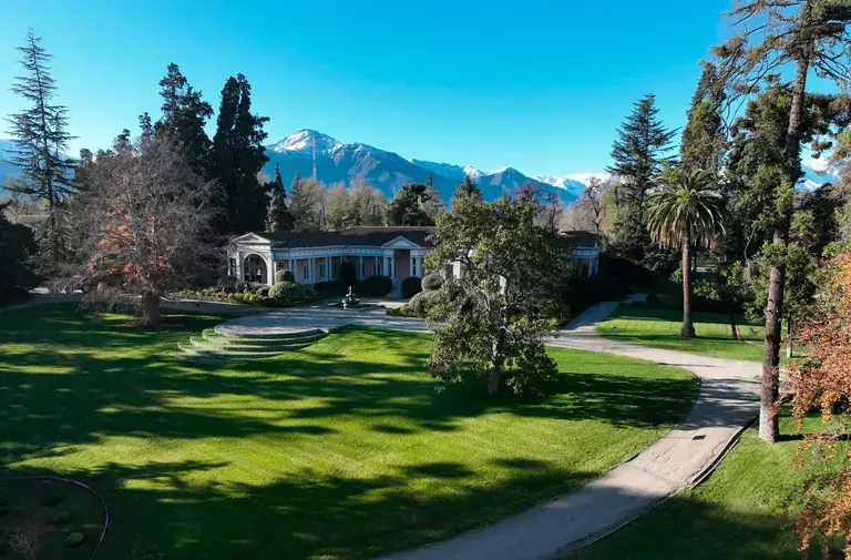 The Concha y Toro manor house and park below the Andes in Pirque